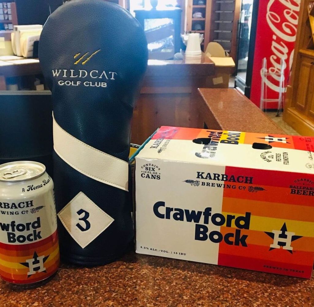 Crawford Bock beer with Wildcat golf clubs 
